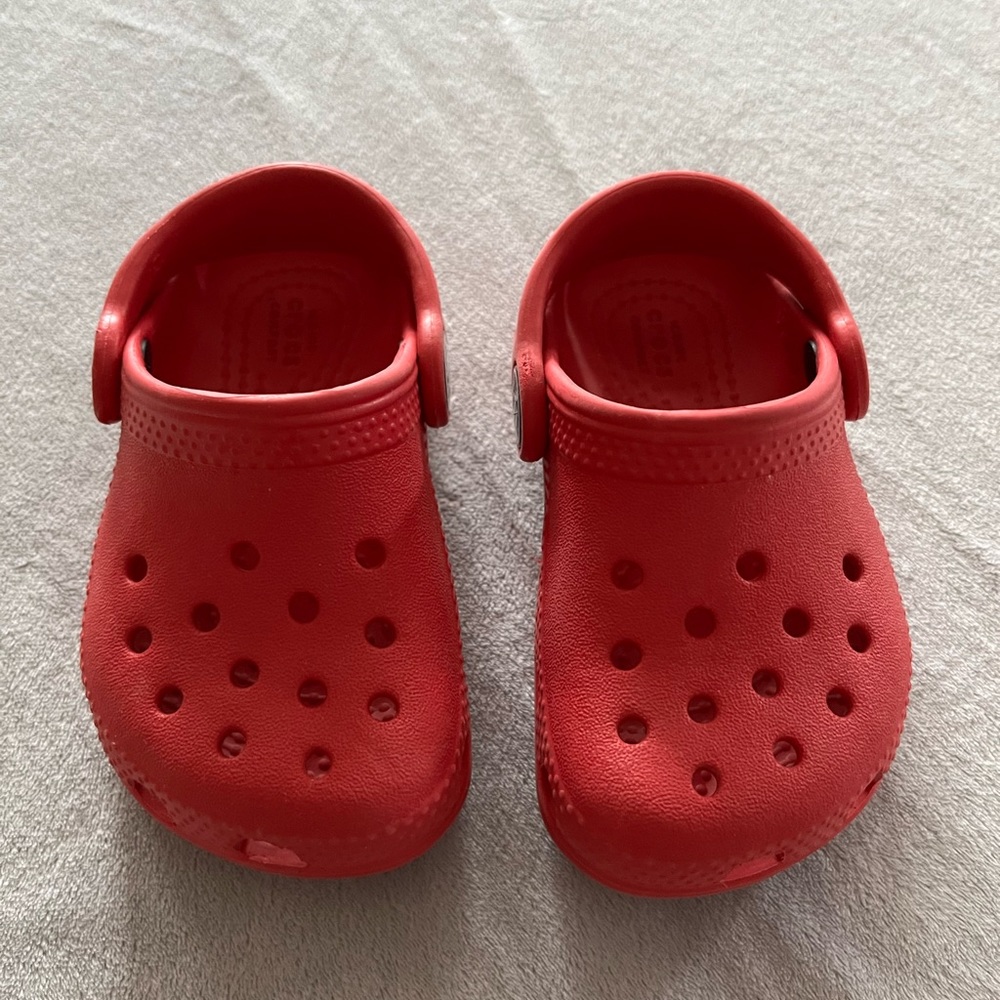 Crocs red classic clogs, size 5 toddler.